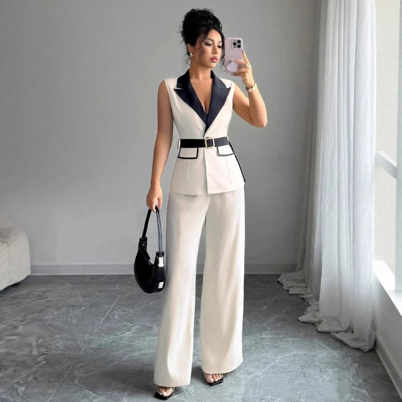Fashion women's clothing with elegant style, V-neck, waist-revealing, sleeveless top, straight-leg pants. 2-piece set jacket set