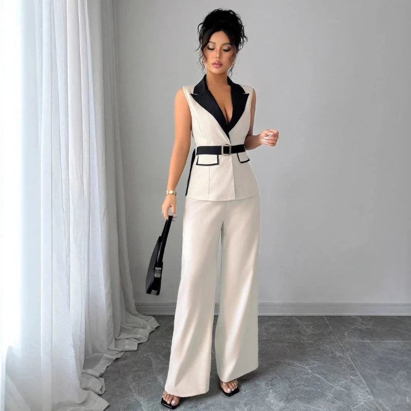 Fashion women's clothing with elegant style, V-neck, waist-revealing, sleeveless top, straight-leg pants. 2-piece set jacket set