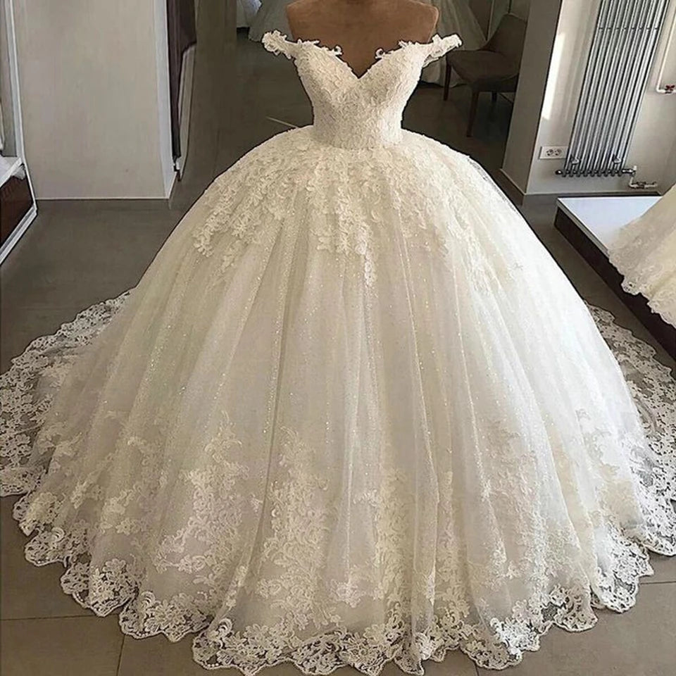 Elegant White/Ivory Off The Shoulder Ball Gown Wedding Dresses 2026 Tulle Appliques Glitter Sequins Bride Gowns Vestido De Noiva